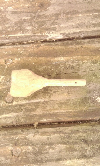 A tuning peg, clearly hand-carved by an amateur.